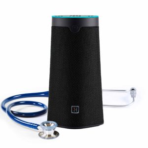 The WellBe Medical Alert Smart Speaker isolated on a white background with a stethoscope.