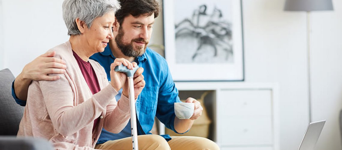 elderly woman with caregiver